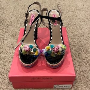 Brand new Betsey Johnson shoes. Never worn. Comes with box.